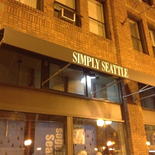 Photo taken at Simply Seattle by Mat X. on 2/18/2012