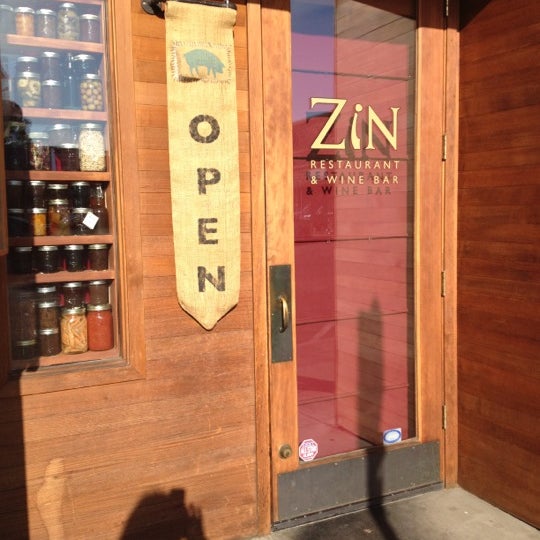 Photo taken at Zin Restaurant &amp; Wine Bar by Carol S. on 5/13/2012