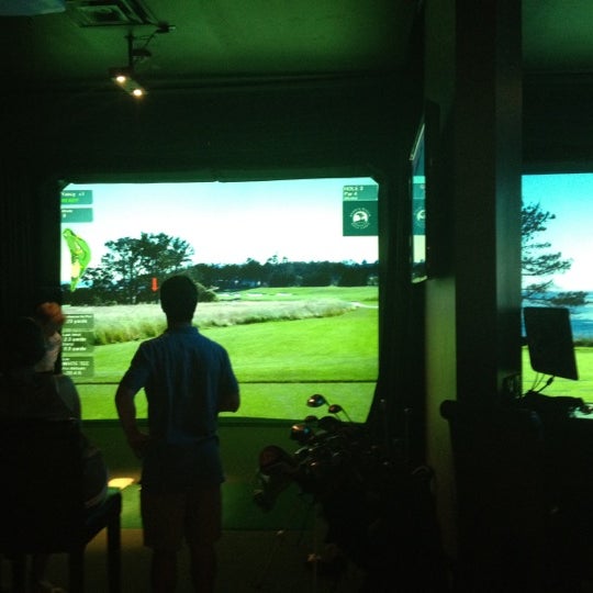 Photo taken at The Range Golf Center &amp; Sports Bar by Randy W. on 7/29/2012