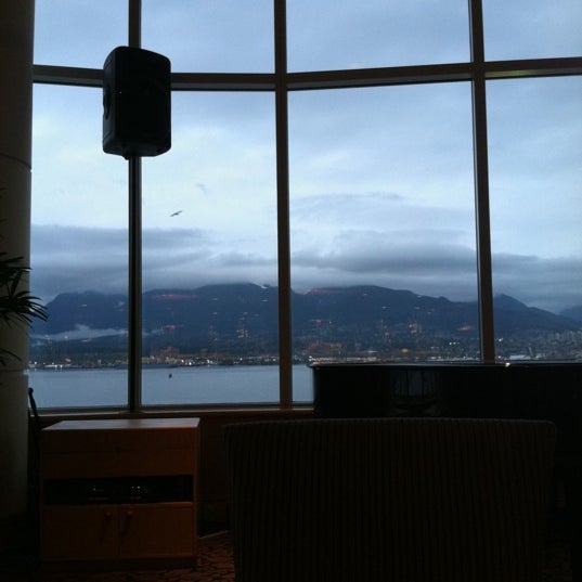 Photo taken at Five Sails Restaurant by Richard F. on 11/9/2011