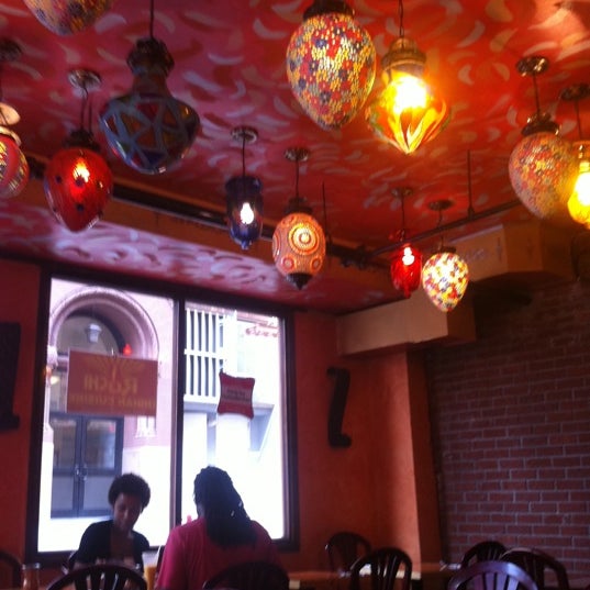 Photo taken at Ruchi Indian Cuisine by Marcela A. on 8/1/2011