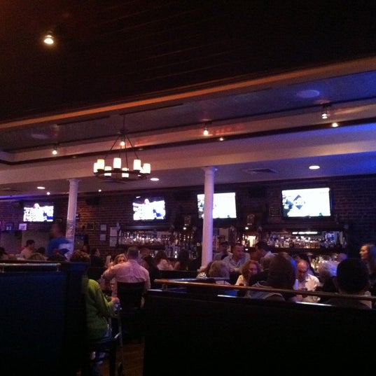 Photo taken at Strawberry&#39;s Sports Grill by Douglas G. on 6/5/2011