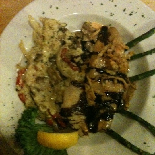 Photo taken at Seasons &amp; Regions Seafood Grill by Gretchen G. on 3/11/2011