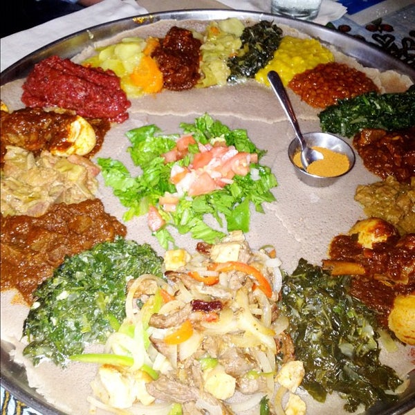 Photo taken at Ethiopian Diamond Restaurant &amp; Bar by David H. on 7/26/2012
