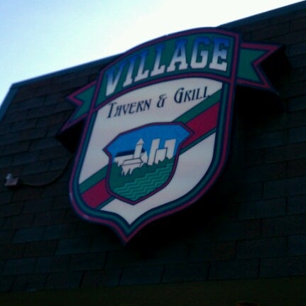Photo taken at Village Tavern &amp; Grill by Amanda O. on 6/17/2012