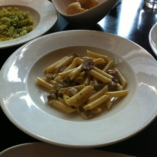 Photo taken at Favola Italian Restaurant 法沃莱意大利餐厅 by Mia D. on 3/25/2012