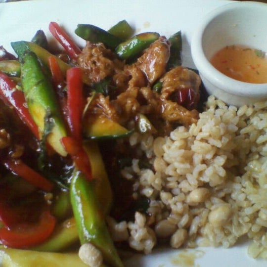 Photo taken at Wild Ginger Pan-Asian Vegan Cafe by Joe K. on 9/6/2011