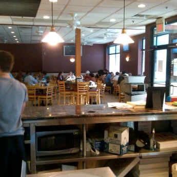 Photo taken at Calabria Pizzeria &amp; Restaurant by Evan W. on 6/2/2011
