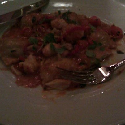 Photo taken at Wolfgang Puck American Grille by Christina R. on 5/1/2011