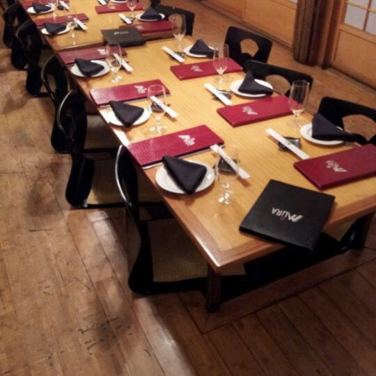 Photo taken at Mura Japanese Restaurant by Rachel H. on 3/7/2012