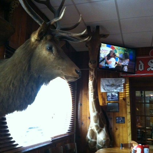 Photo taken at Ole&#39;s Big Game Steakhouse &amp; Lounge by Christian F. on 6/19/2012