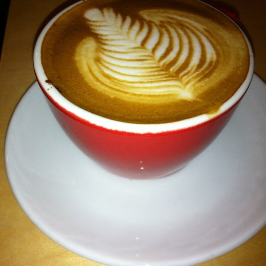 Photo taken at New World Coffee House by Chris F. on 12/9/2011