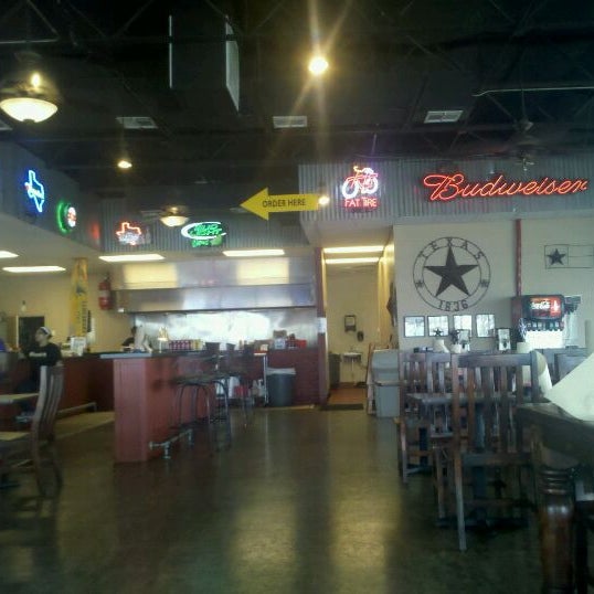 Photo taken at Moonie&#39;s Burger House - Anderson Mill by Alli C. on 9/16/2011