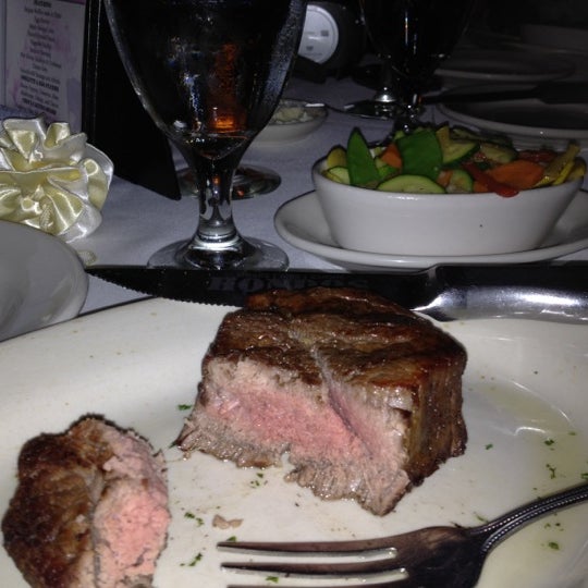 Photo taken at Hondo&#39;s Prime Steakhouse by Yuna L. on 6/30/2012