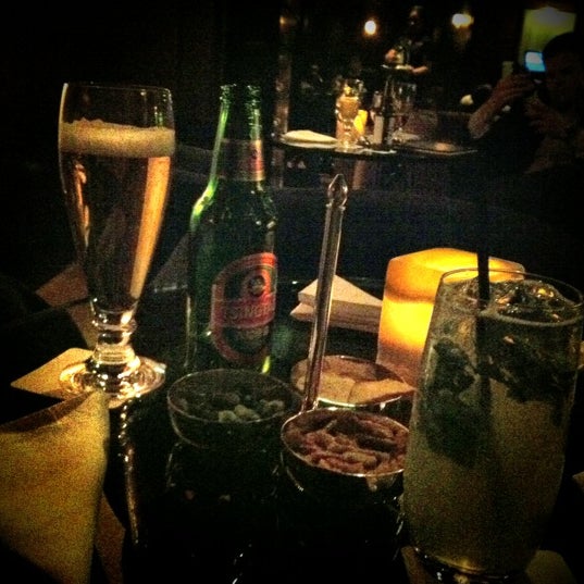 Photo taken at The Bar at The Peninsula by Myra R. on 3/11/2012