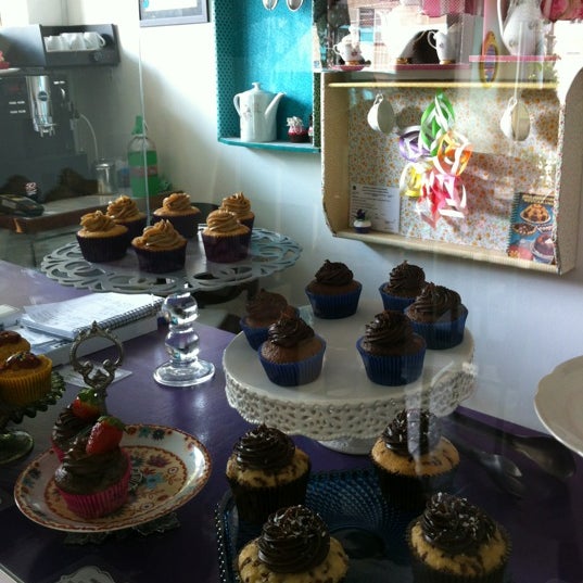 Photo taken at The Cake is on the Table by Jaqueline A. on 6/2/2012