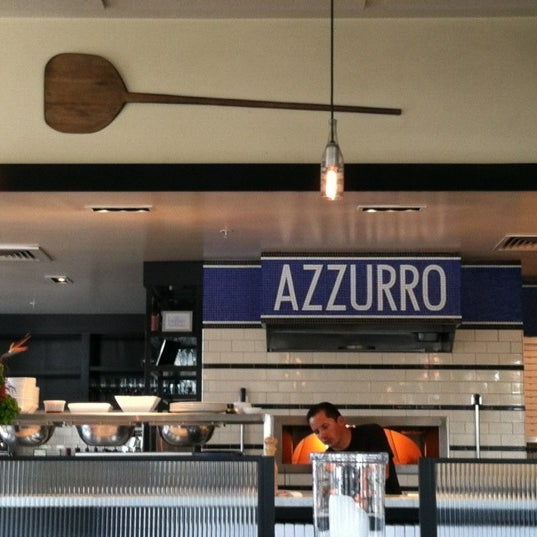 Photo taken at Azzurro Pizzeria e Enoteca by Sheila P. on 4/1/2012