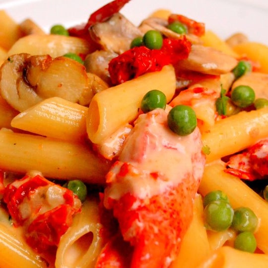 Pasta a la Arrogosta.  Lobster, Green Peas, Mushrooms and Sun-Dried Tomatoes in a Light Pink Rose Sauce. Delicious!
