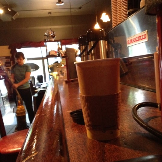 Photo taken at Nervous Dog Coffee Bar &amp; Roaster by Steven B. on 5/2/2012