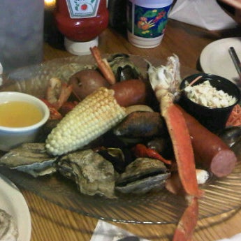 Photo taken at Dockside Seafood Restaurant by Journo G. on 4/15/2012