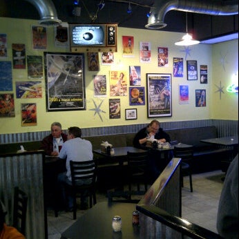 Photo taken at Flying Saucer Pizza by roger m. on 10/28/2011