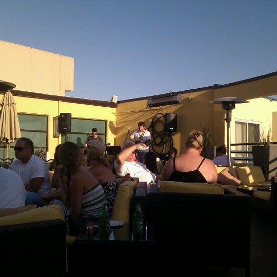 Photo taken at Vivo Rooftop Lounge by c b. on 8/28/2011