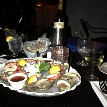 Photo taken at Blue Water Seafood by Michael on 3/23/2012