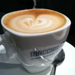 Photo taken at Macchiato Espresso Bar by Built F. on 9/4/2012