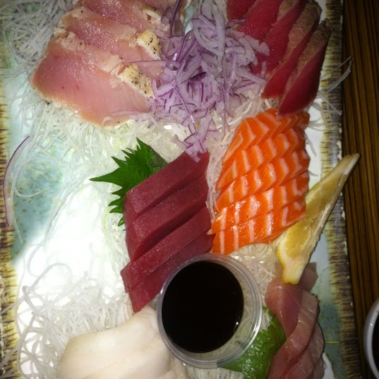 Photo taken at Sushi Dan by Cristina G. on 1/15/2012
