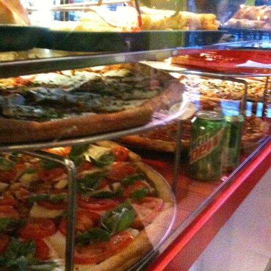 Photo taken at Nino&#39;s Pizza of New York by Jon S. on 1/8/2011