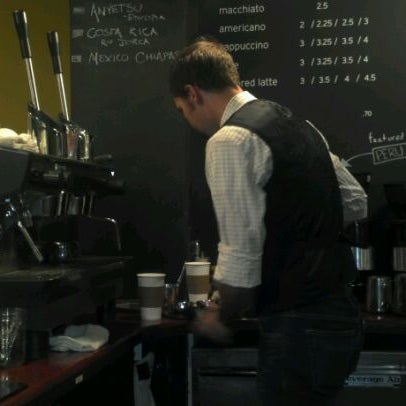 Photo taken at Two Rivers Craft Coffee Company by Robert M. on 1/6/2012