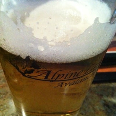 Photo taken at Alpine Lanes and Avalanche Grill by Marissa G. on 7/26/2012