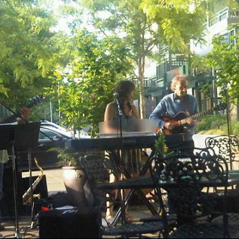 Photo taken at Orenco Station Grill by Shannon T. on 6/26/2011