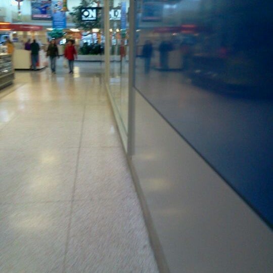 Photo taken at Merle Hay Mall by Macey M. on 1/1/2012