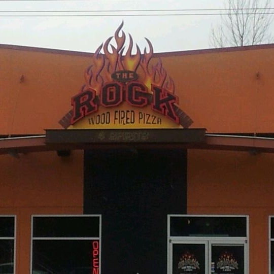 Photo taken at The Rock Wood Fired Pizza by John E. on 3/9/2012