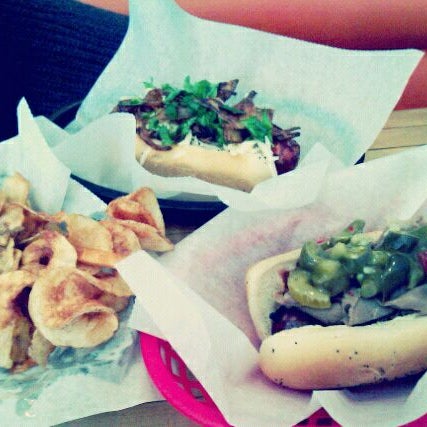 Photo taken at Chicago&#39;s Dog House by Oscar D. on 8/22/2011