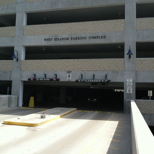Photo taken at West Stadium Parking Complex by Joan A. on 9/12/2011