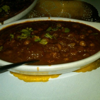 Photo taken at INDIA K&#39; RAJA Restaurant by Mari C. on 10/20/2011