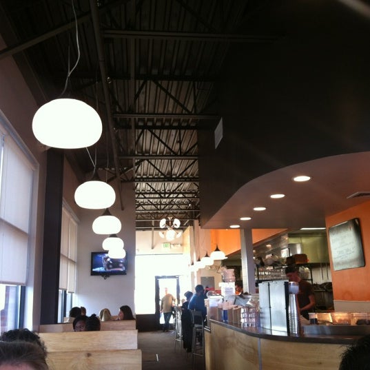Photo taken at Crave Real Burgers by Anh N. on 11/13/2011