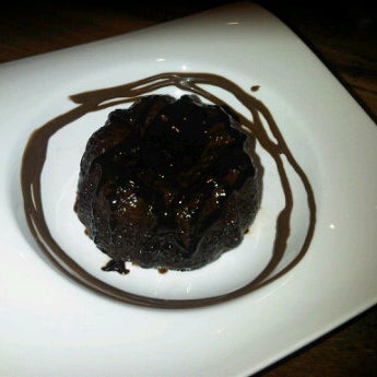 Photo taken at Indulge Dessert Lounge by Rida R. on 12/23/2011