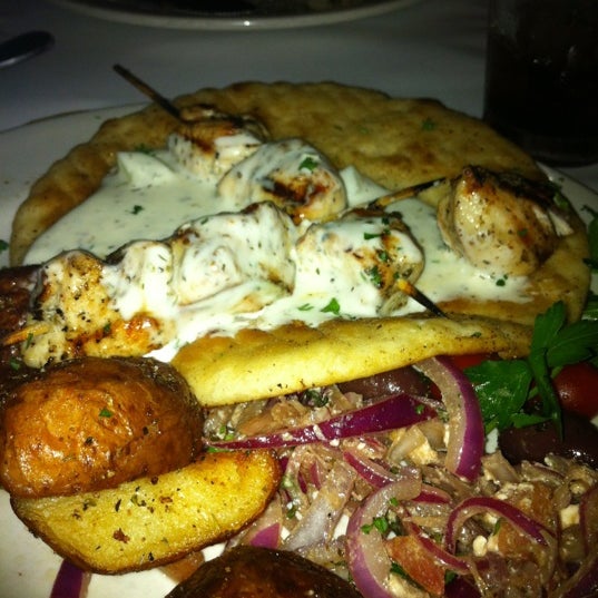 Photo taken at Ziziki&#39;s Restaurant by Nancy W. on 4/8/2012