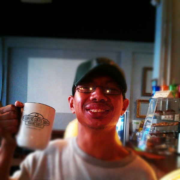 Photo taken at Surfers Coffee Bar by Sam A. on 6/2/2012