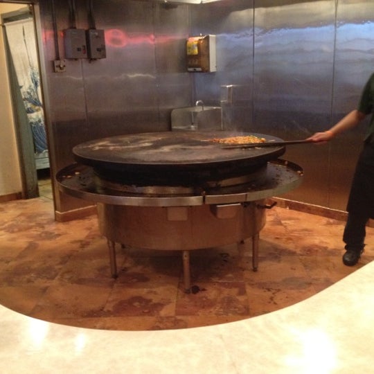 Photo taken at Empire Fire Mongolian Grill by Ryan on 8/17/2012