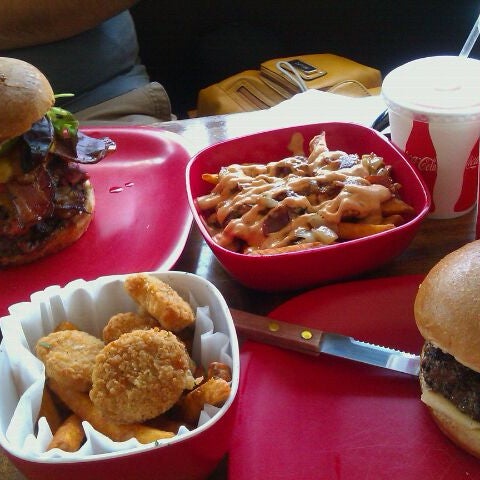 Photo taken at G Burger by Andrea V. on 4/9/2012