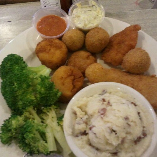 Photo taken at Snockey&#39;s Oyster &amp; Crab House by Koko J. on 1/26/2012