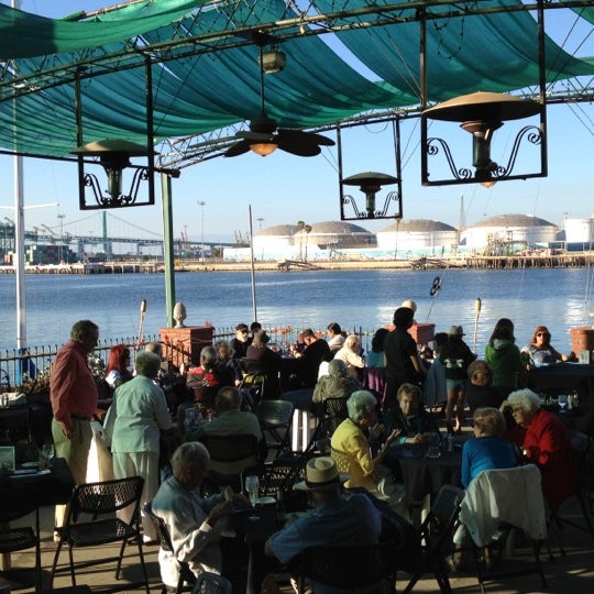 Photo taken at Ports O&#39; Call Waterfront Dining Restaurant by Kate M. on 7/7/2012