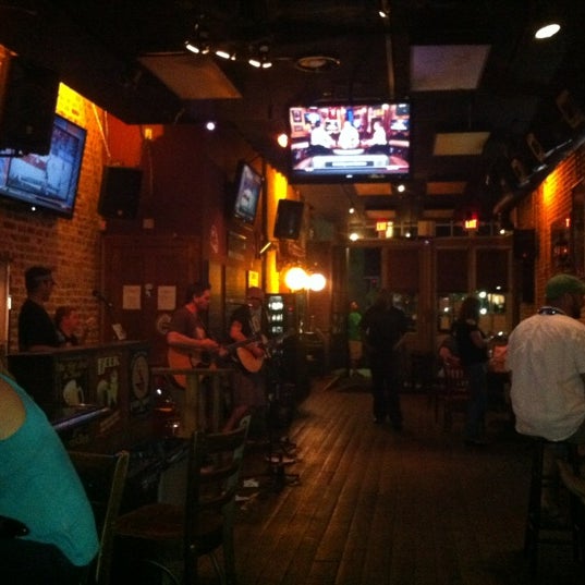 Photo taken at The Brick: Charleston&#39;s Favorite Tavern by Ashley C. on 3/30/2012