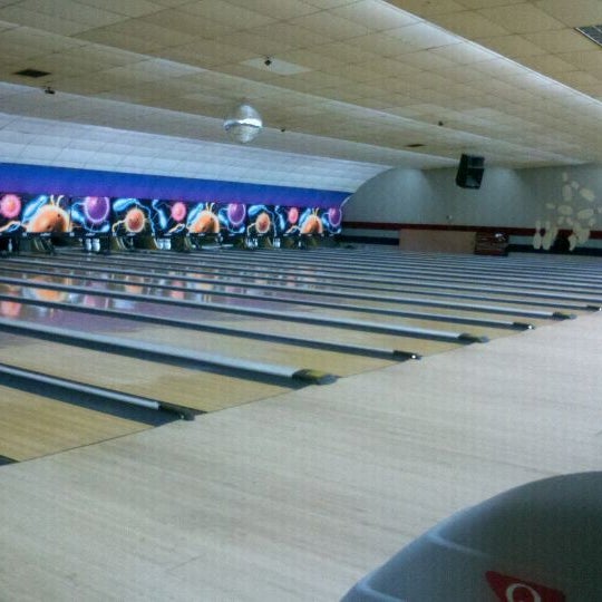 Photo taken at Woodmere Lanes by Claudia D. on 9/21/2011