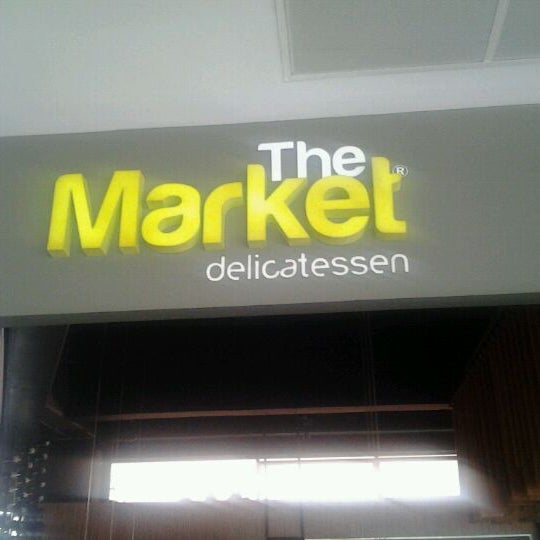 Photo taken at The Market Delicatessen by Alejandra on 12/6/2011
