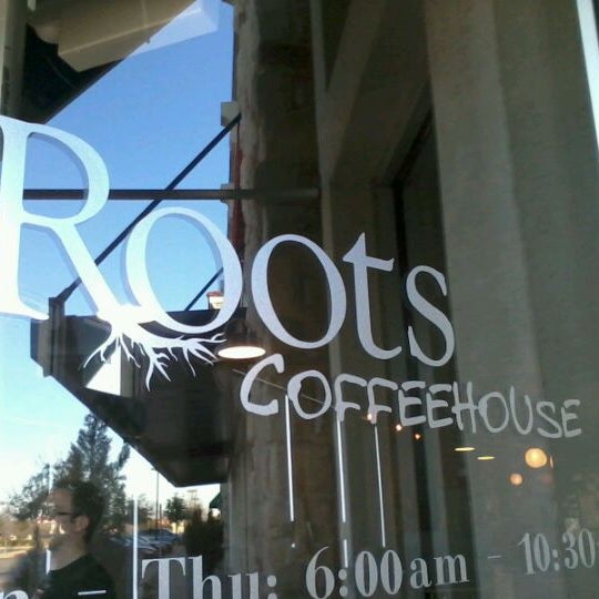 Photo taken at Roots Coffeehouse by Mark C. on 1/13/2012
